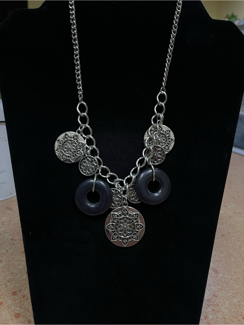 Silver-Tone Floral Medallion Necklace with Black Donut Charms